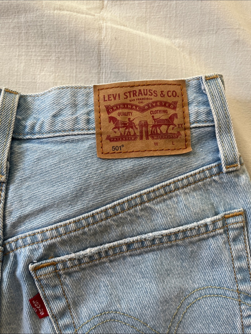 Levi's Light Blue Distressed Cutoff Denim Shorts - Picture 3 of 7